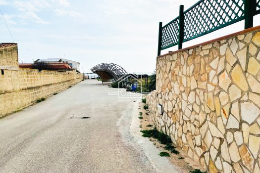 Appartamento con ampia Veranda a Punta Braccetto
