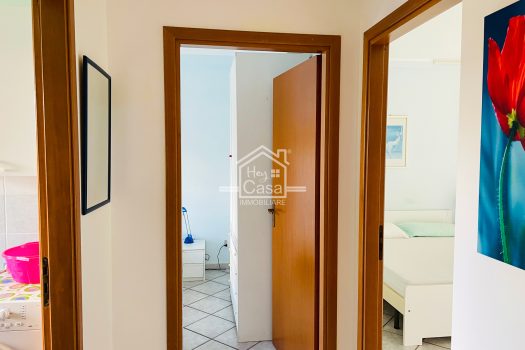 Appartamento con ampia Veranda a Punta Braccetto