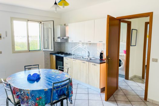 Appartamento con ampia Veranda a Punta Braccetto